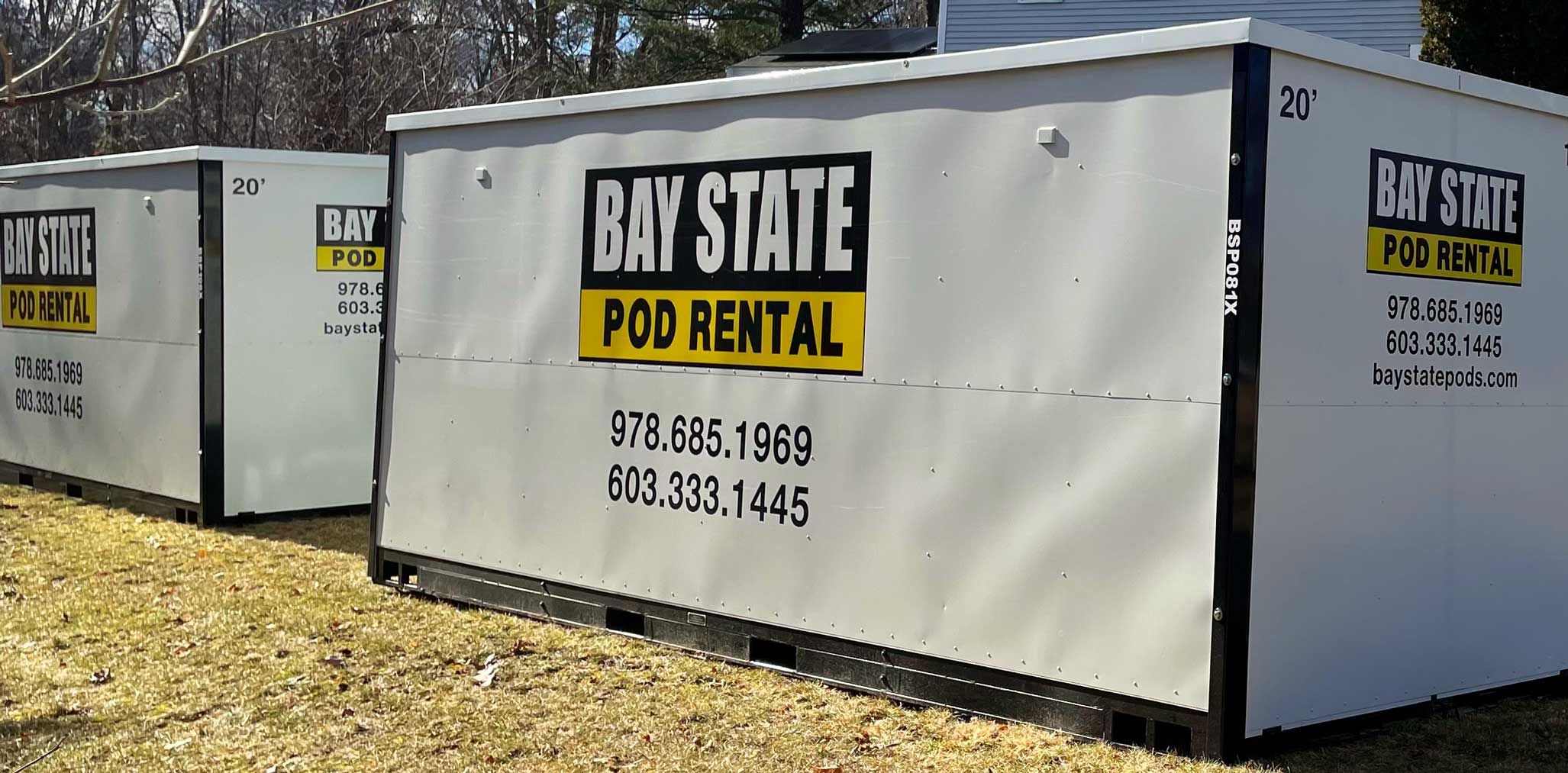 Two white Bay State storage pods